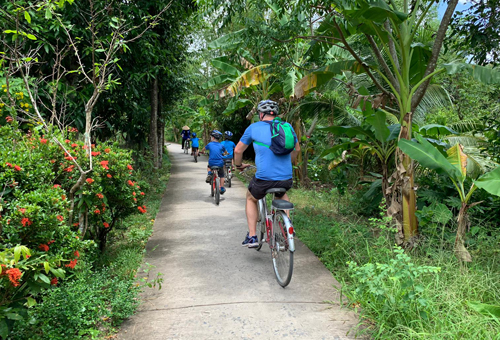 Family cycling in the Mekong Delta region